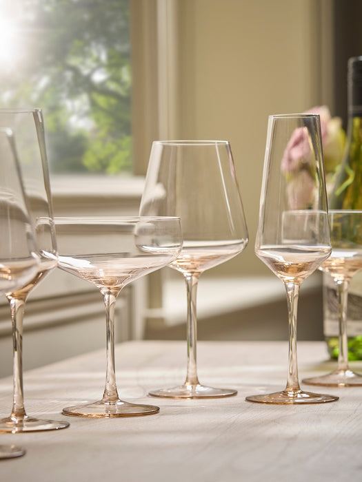 Four Golden Champagne Coupes