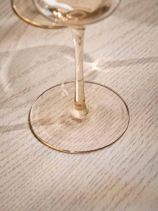 Four Golden Champagne Coupes