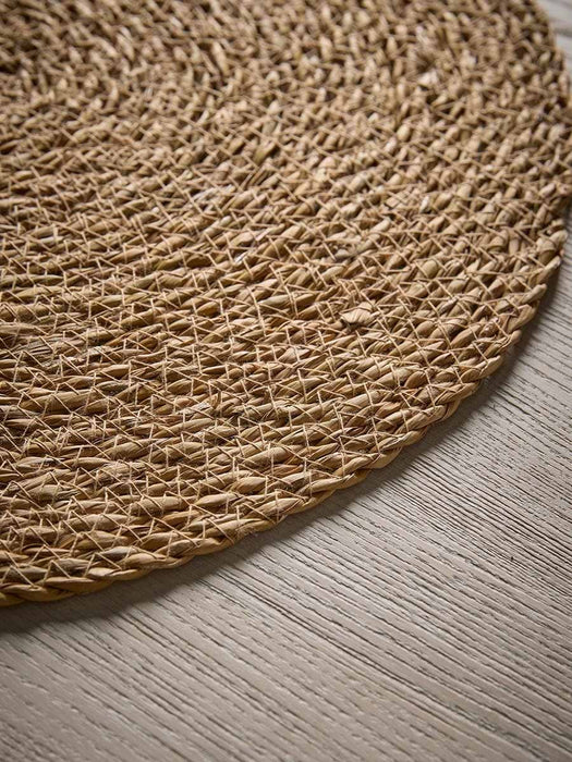 Four Round Hogla Grass Placemats