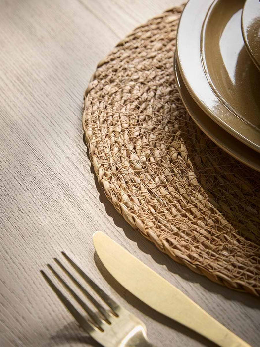 Four Round Hogla Grass Placemats