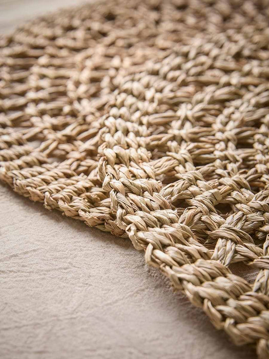 Two Round Decorative Seagrass Placemats