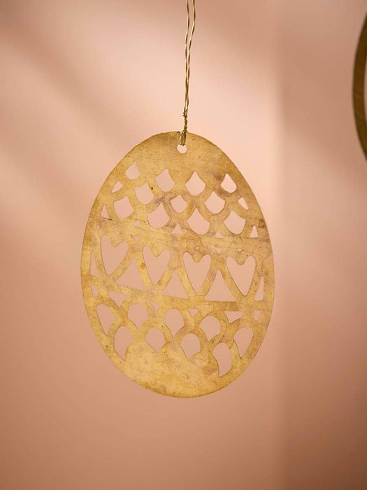 Two Hanging Metal Eggs