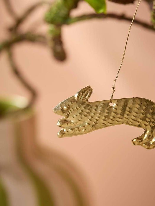 Three Hanging Metal Rabbits