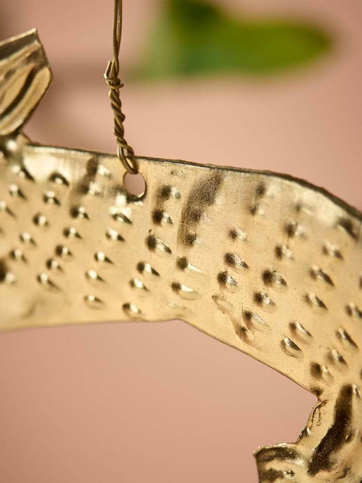 Three Hanging Metal Rabbits