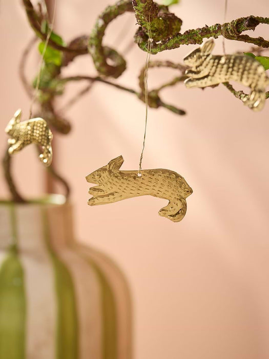 Three Hanging Metal Rabbits
