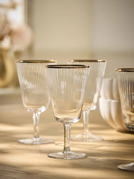 Four Gold Rim Wine Glasses
