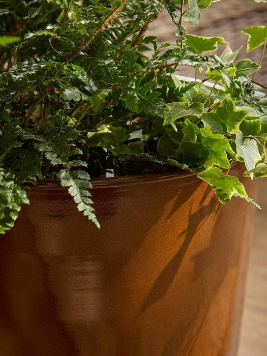 Two Extra Large Brown Metal Planters