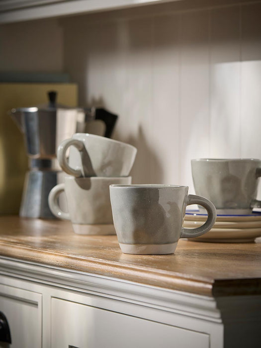 Four Blue Glazed Mugs