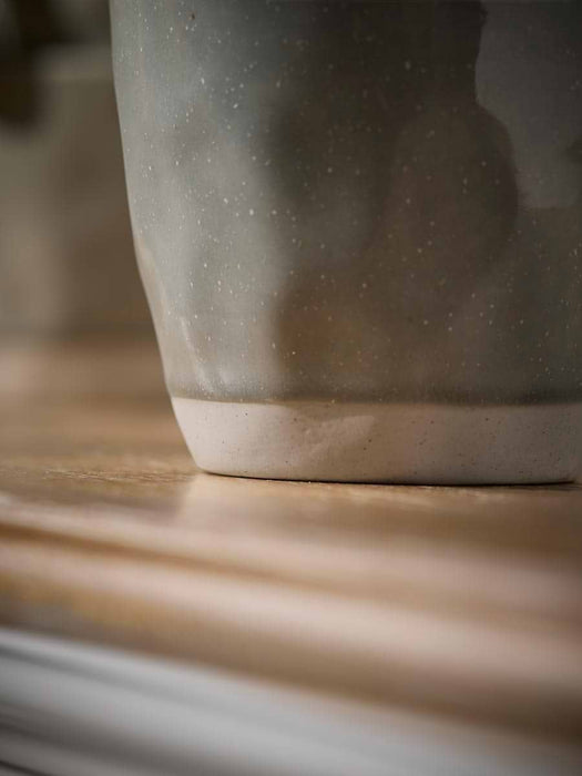 Four Blue Glazed Mugs