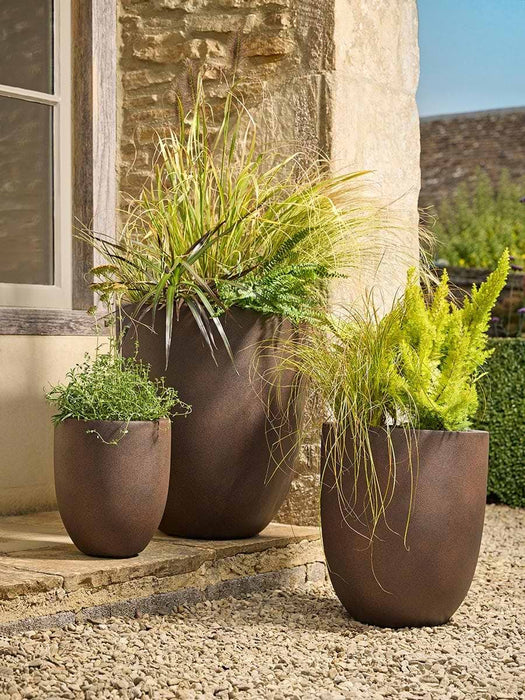 Three Rust Effect Tapered Planters
