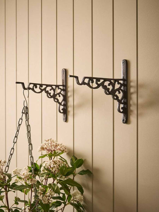 Two Cast Iron Basket Hooks